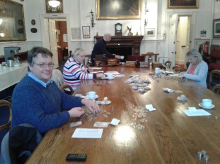 Members of the choir committee counting the christmas eve collection