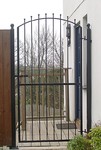 Curved top iron gate by Kevin Gerry